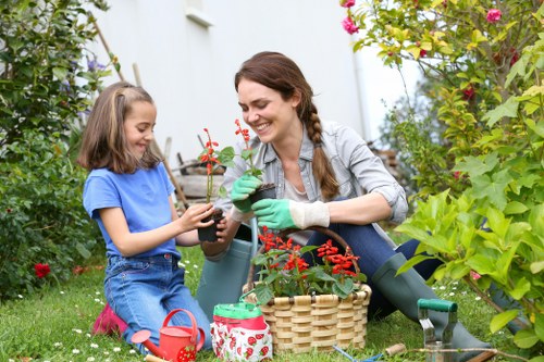Gardener preparing to mow a lawn at a residential property